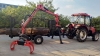 RIMA timber trailer with crane and grapple